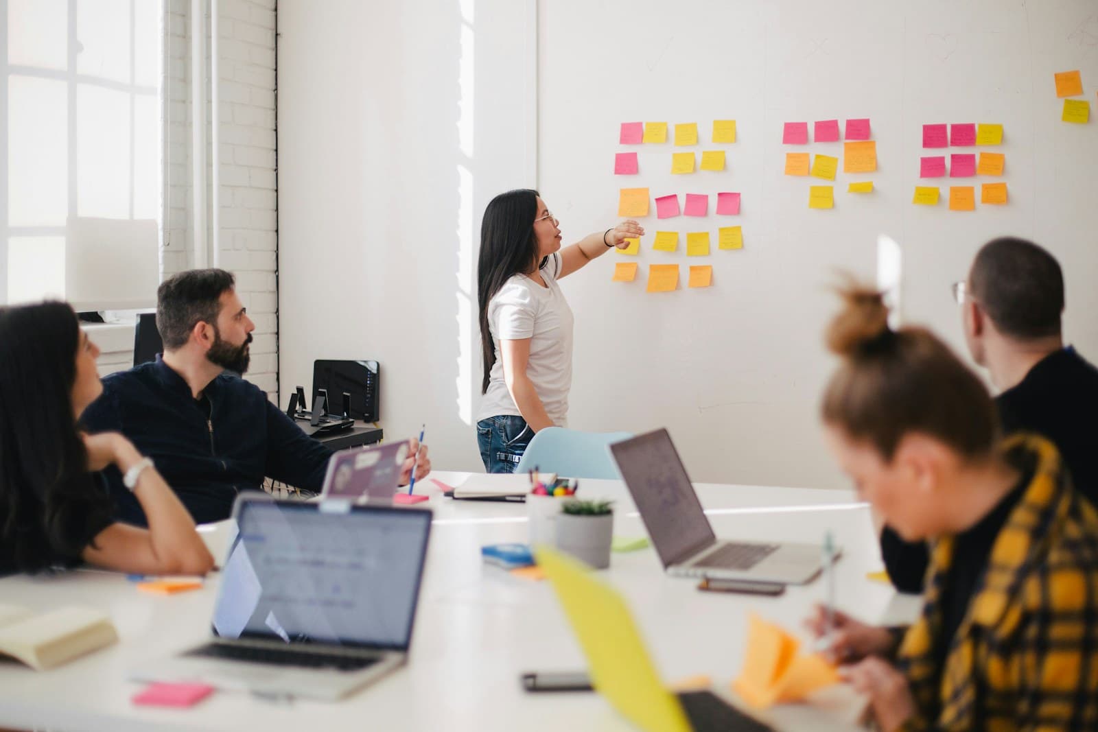 Team arranging a website redesign plan